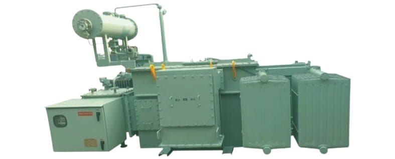 Oil-cooled distribution transformer with conservator tank and radiator banks, manufactured by Tula Trans Electricals, Surat